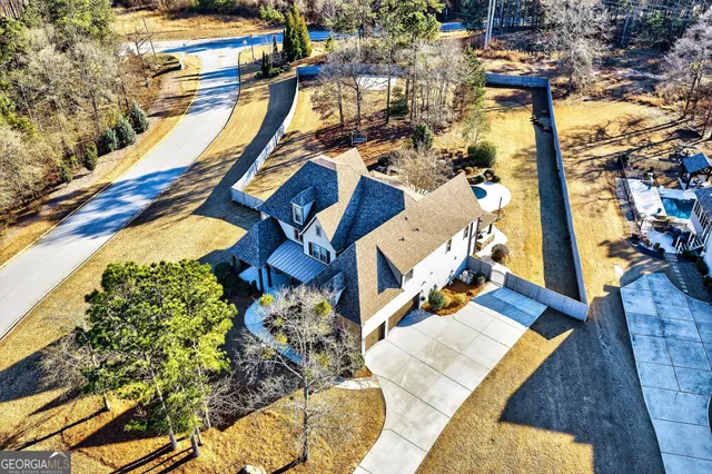 a living room with a fireplace and a flat screen tv