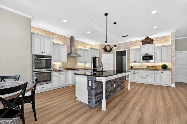 a bathroom with a shower and a sink