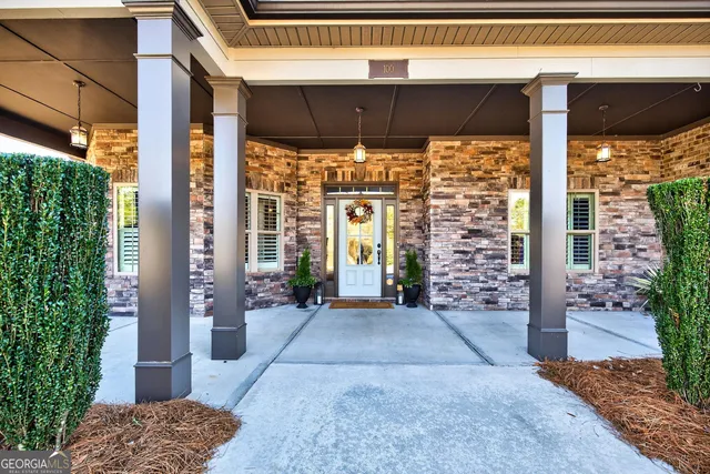 a view of a living room with a large window
