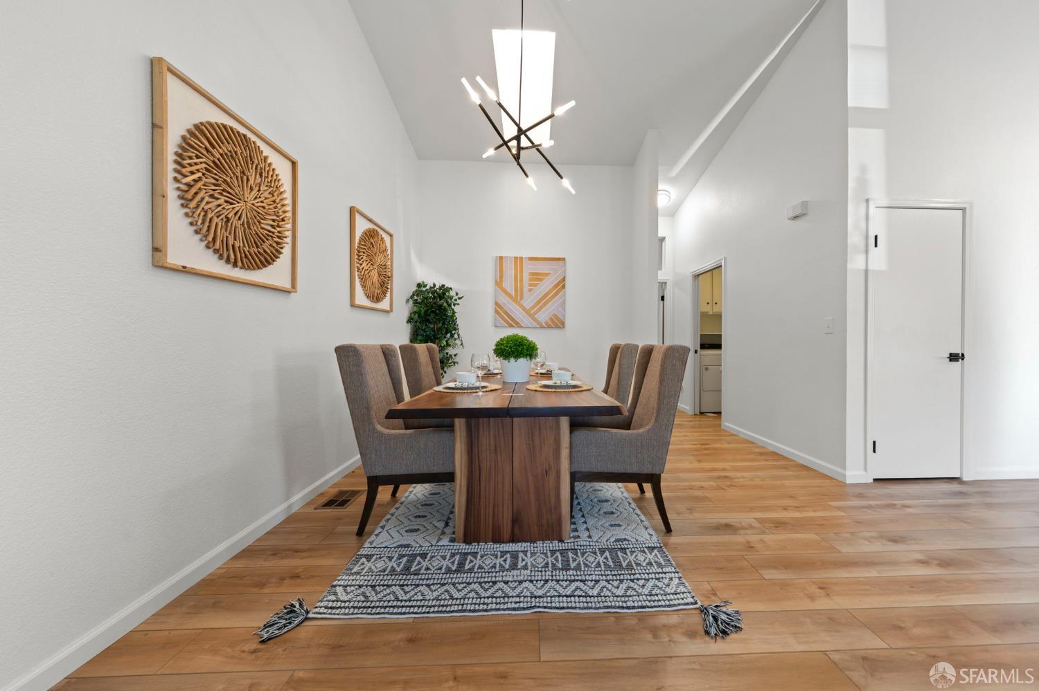 1806 Evalane Way Concord, CA 94519 - Photo 16 of 81 a view of a dining room with furniture and wooden floor
