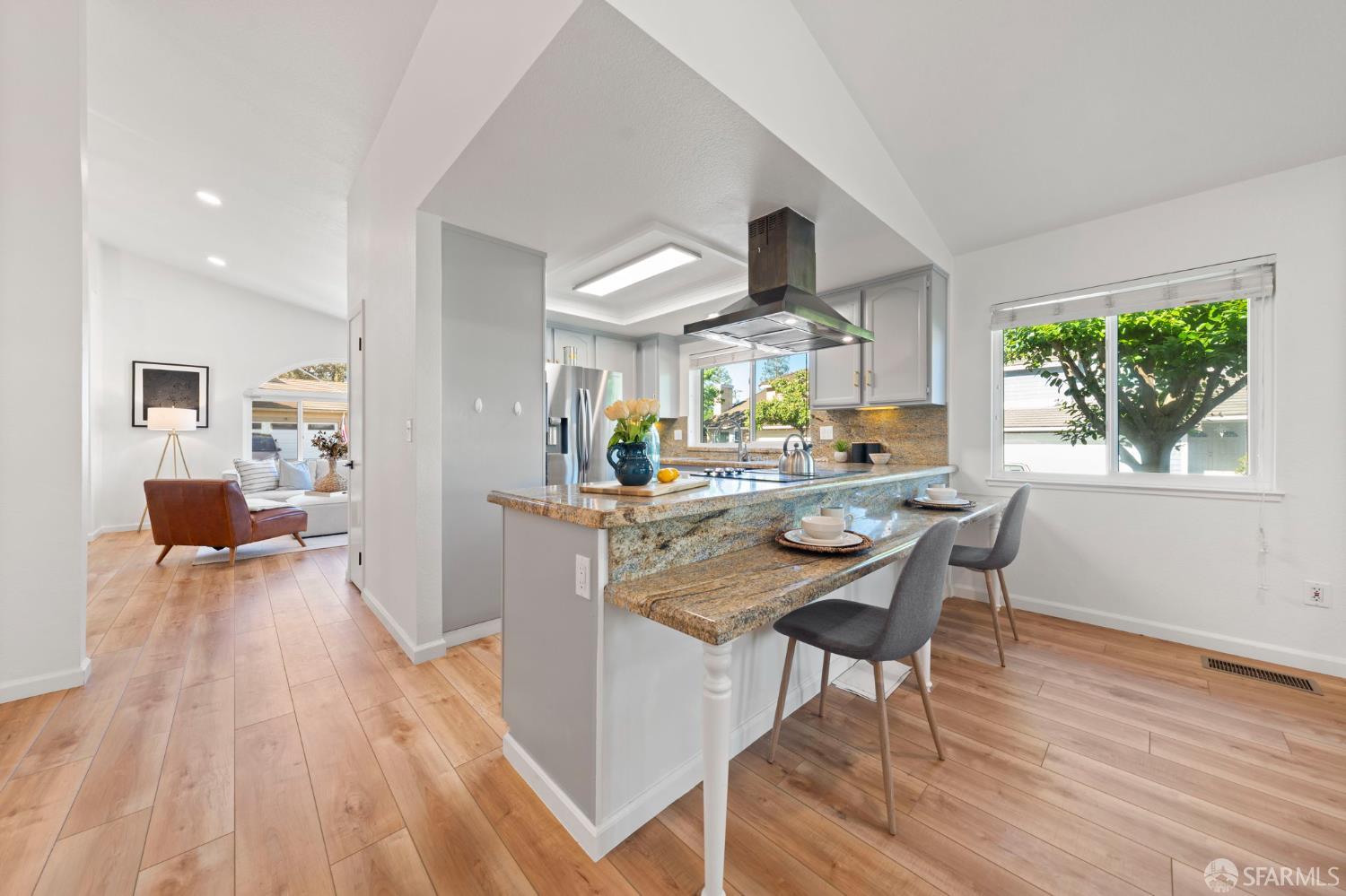 1806 Evalane Way Concord, CA 94519 - Photo 21 of 81 a kitchen with stainless steel appliances granite countertop wooden floor dining table and chairs