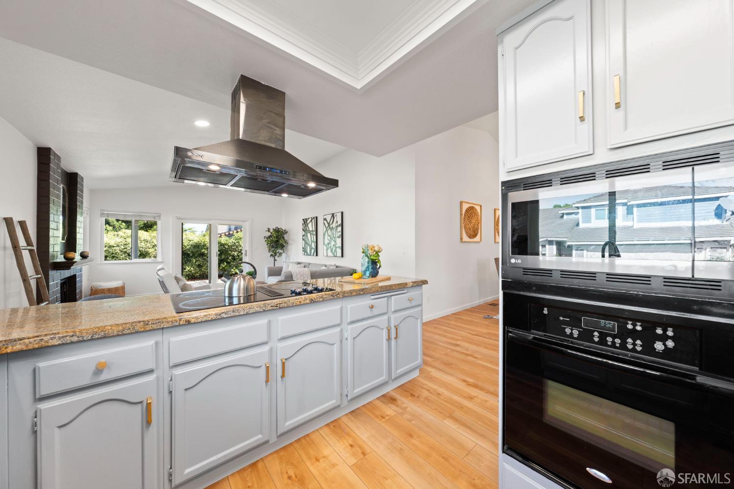 1806 Evalane Way Concord, CA 94519 - Photo 28 of 81 a kitchen with stainless steel appliances a stove a sink and a white cabinets