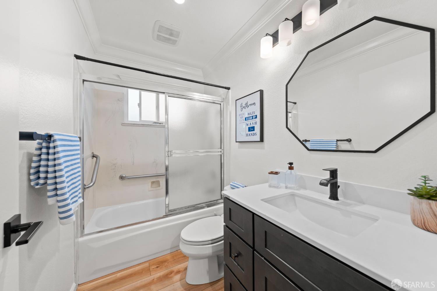 1806 Evalane Way Concord, CA 94519 - Photo 44 of 81 a bathroom with a sink a toilet and shower