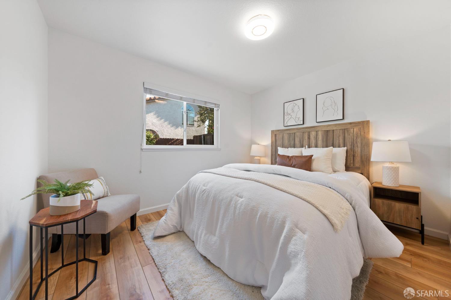 1806 Evalane Way Concord, CA 94519 - Photo 49 of 81 a bedroom with a bed and wooden floor