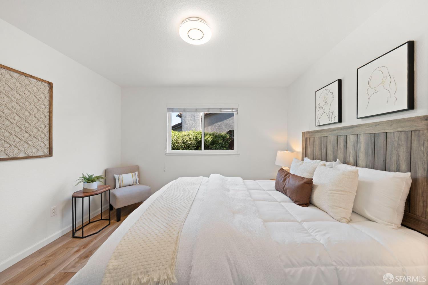 1806 Evalane Way Concord, CA 94519 - Photo 52 of 81 a bedroom with a bed and a night stand