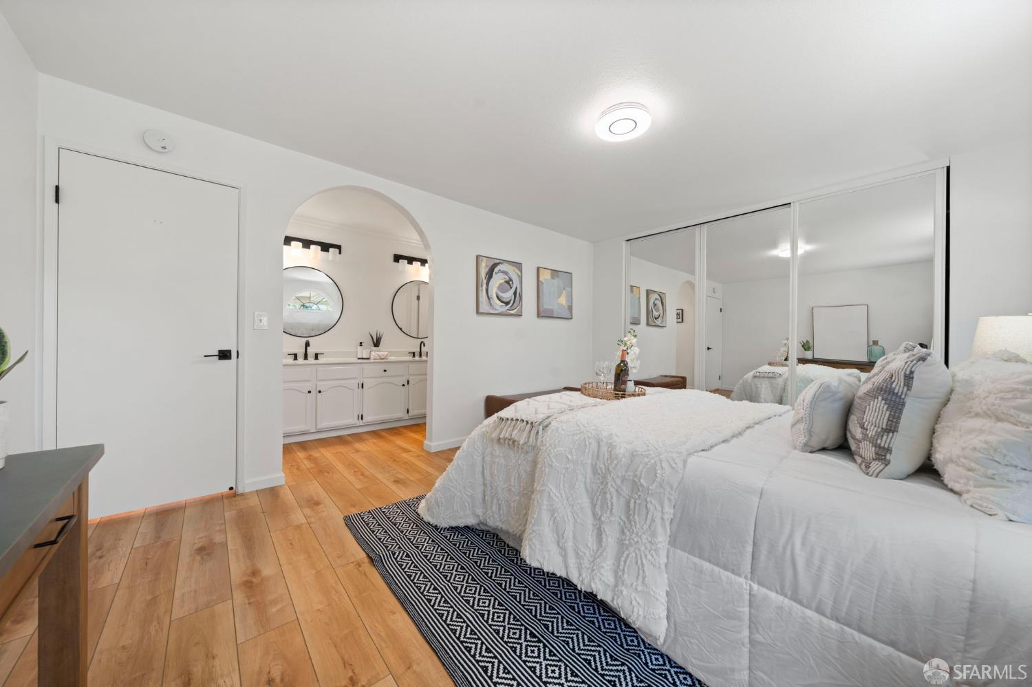 1806 Evalane Way Concord, CA 94519 - Photo 56 of 81 a bedroom with a bed and painting on the wall