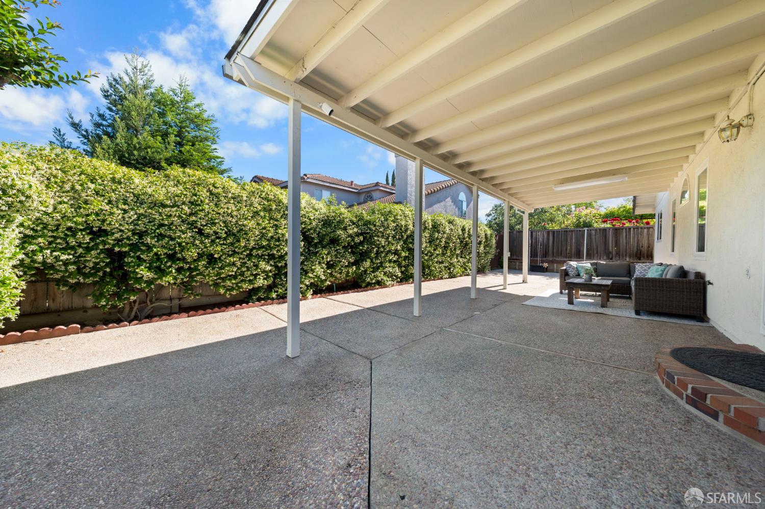 1806 Evalane Way Concord, CA 94519 - Photo 63 of 81 a view of a patio with table and chairs and potted plants