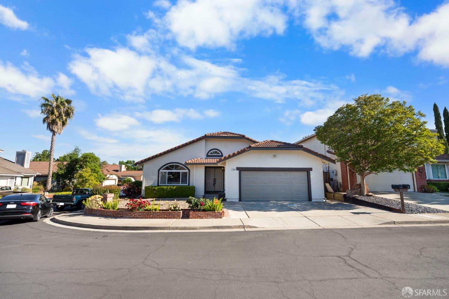 1806 Evalane Way Concord, CA 94519 - Photo 69 of 81 a front view of a house with a garden and mountain view