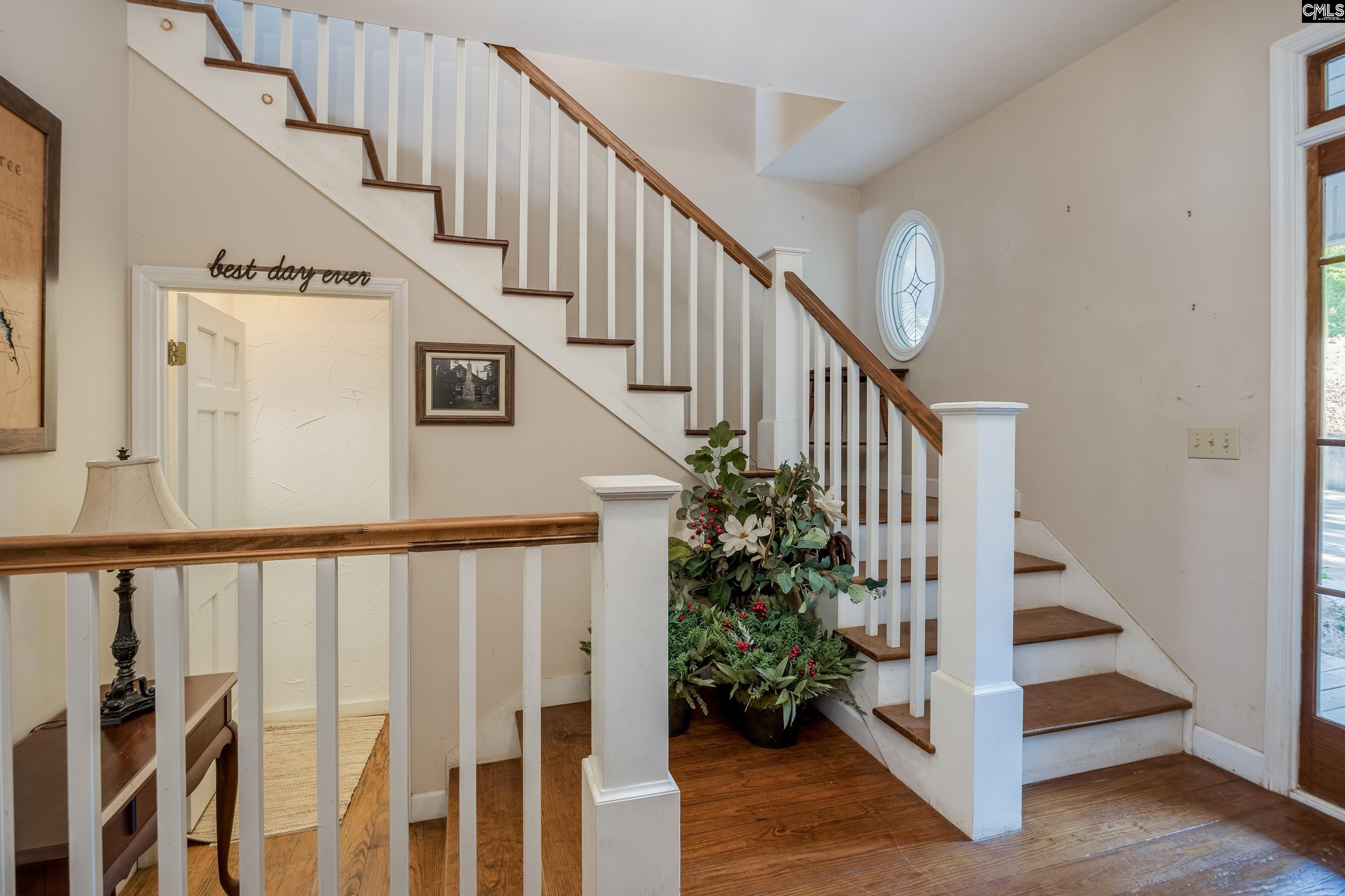 2577 Harbor View Road Camden, SC 29020 - Photo 11 of 42 a view of entryway with wooden floor and stairs