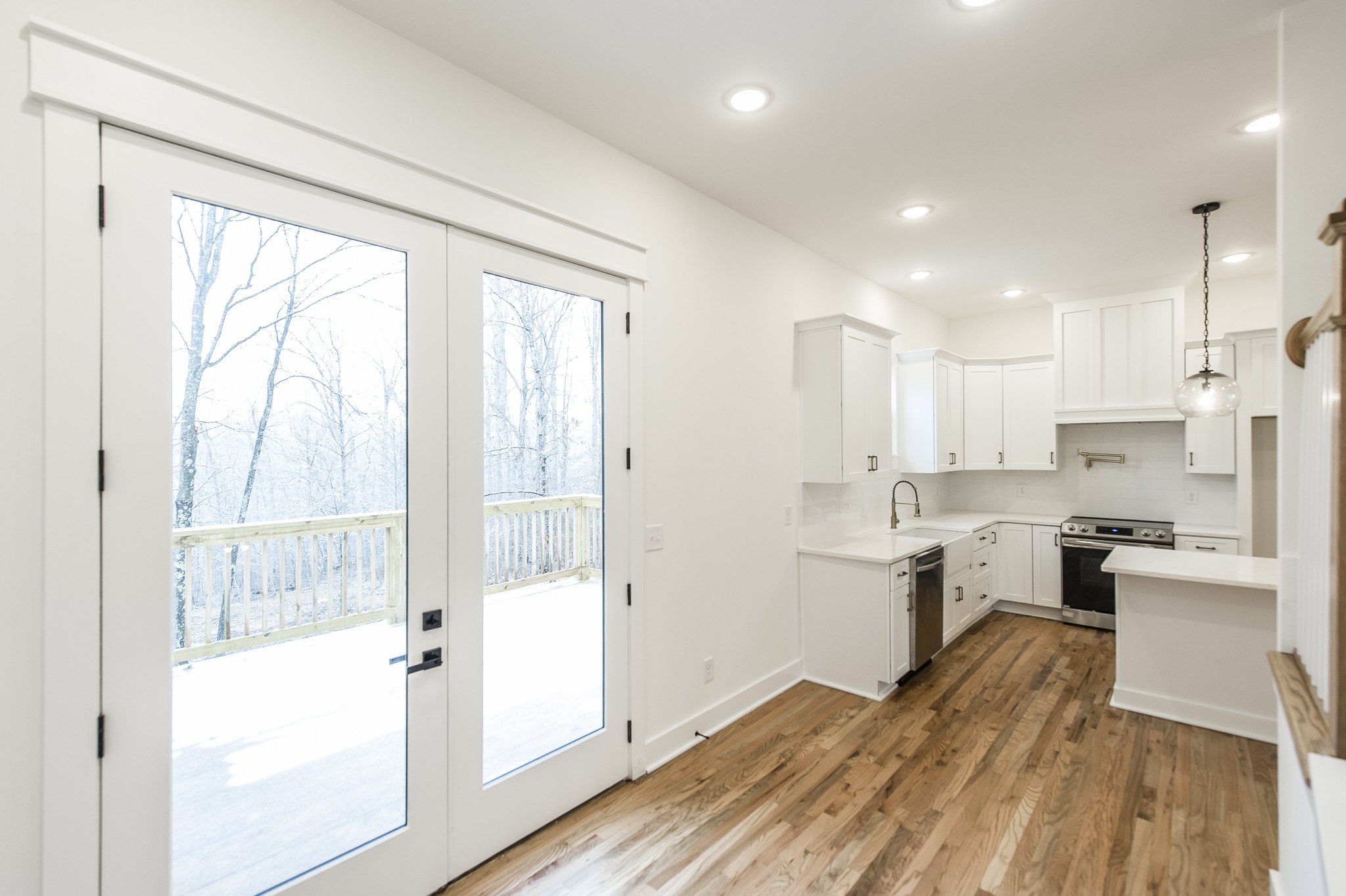 2026 Beaver Ridge Road Burns, TN 37029 - Photo 13 of 45 a kitchen with a refrigerator a sink and a stove top oven