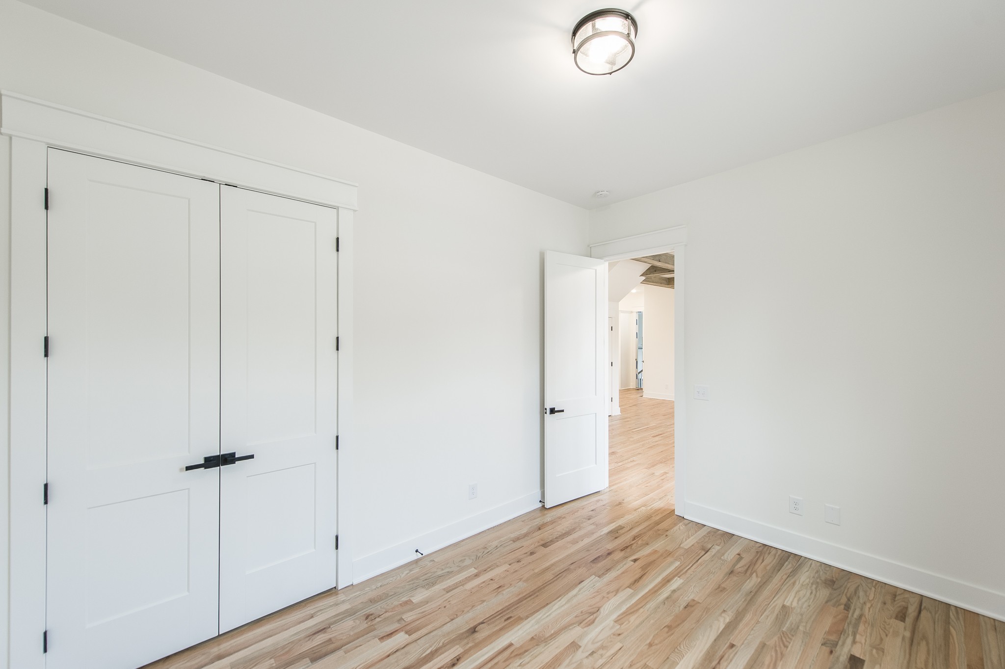 2026 Beaver Ridge Road Burns, TN 37029 - Photo 26 of 45 a view of an empty room with wooden floor