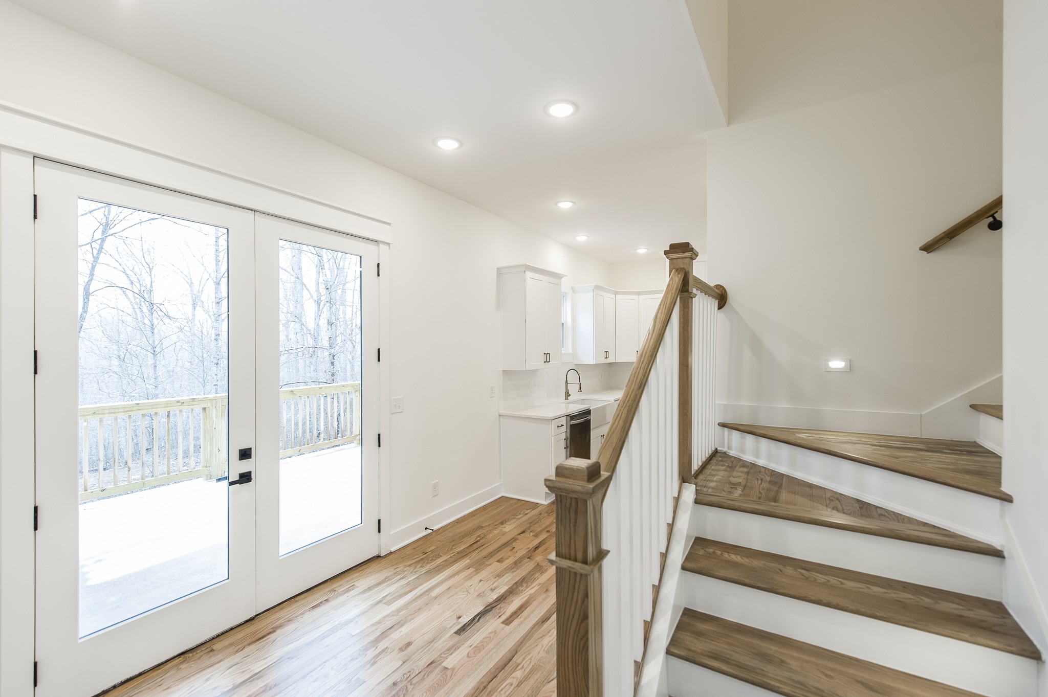 2026 Beaver Ridge Road Burns, TN 37029 - Photo 32 of 45 a view of entryway with wooden floor and stairs