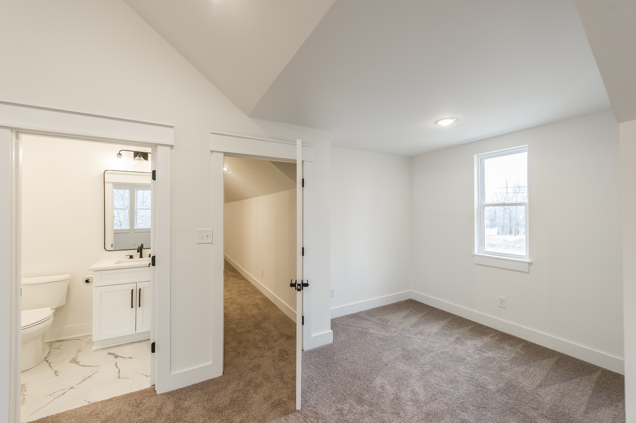 2026 Beaver Ridge Road Burns, TN 37029 - Photo 37 of 45 an empty room with windows and entrance