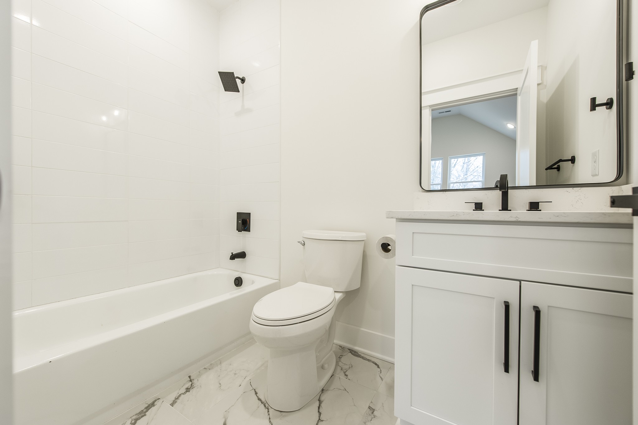 2026 Beaver Ridge Road Burns, TN 37029 - Photo 38 of 45 a bathroom with a sink toilet and shower