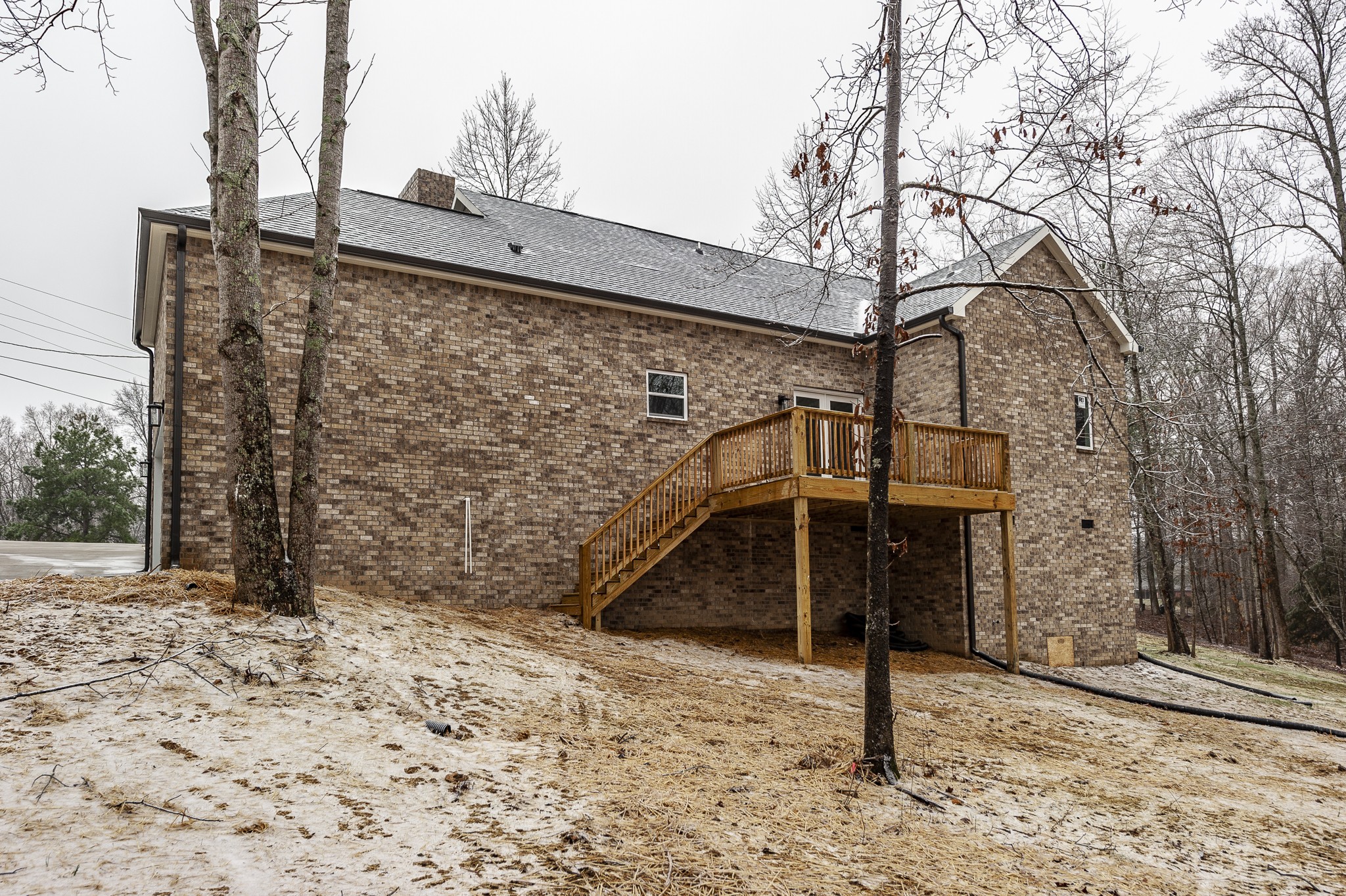 2026 Beaver Ridge Road Burns, TN 37029 - Photo 40 of 45 a view of a house with a snow on the road