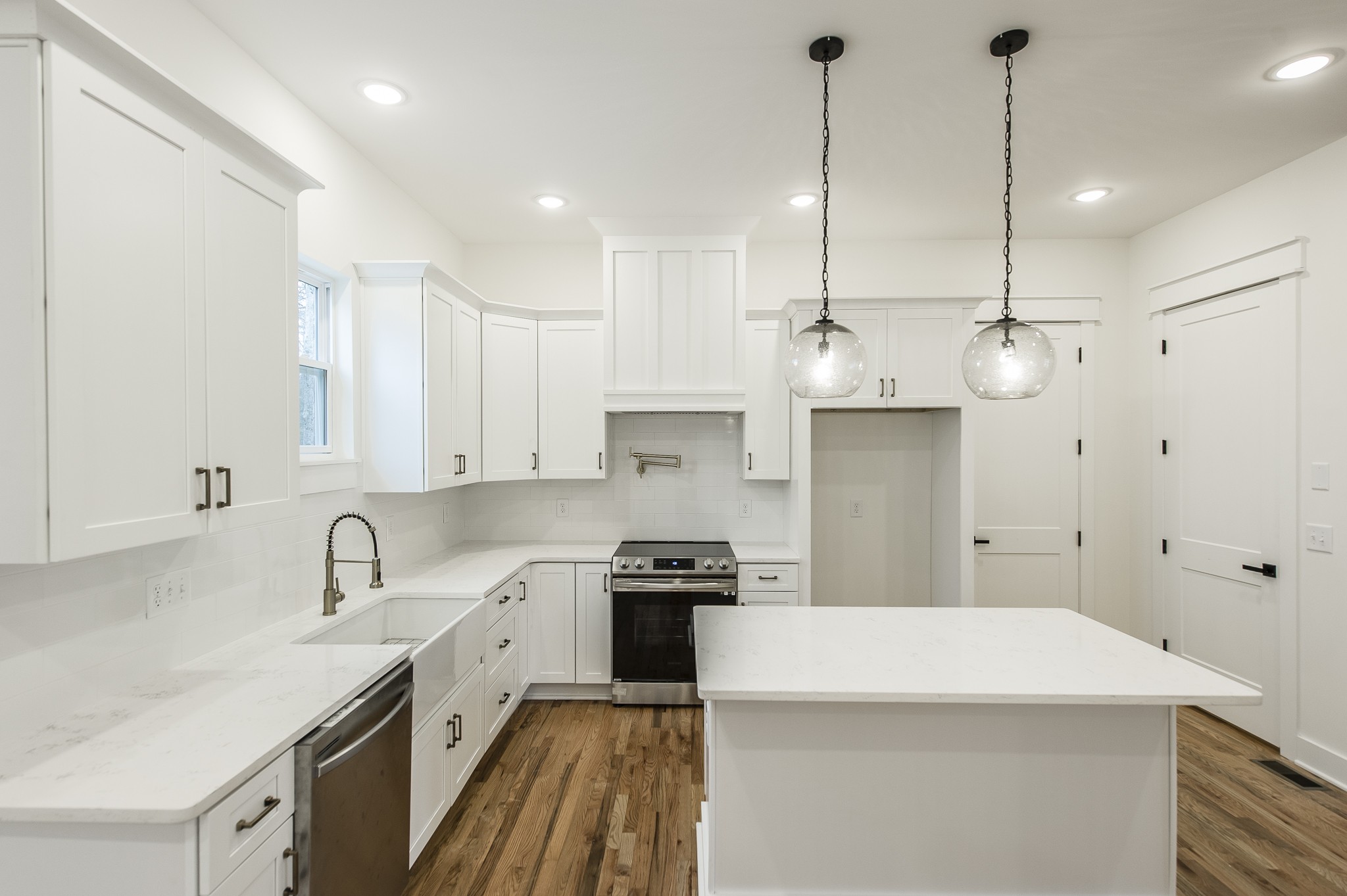 2026 Beaver Ridge Road Burns, TN 37029 - Photo 9 of 45 a kitchen with kitchen island a sink stainless steel appliances and cabinets
