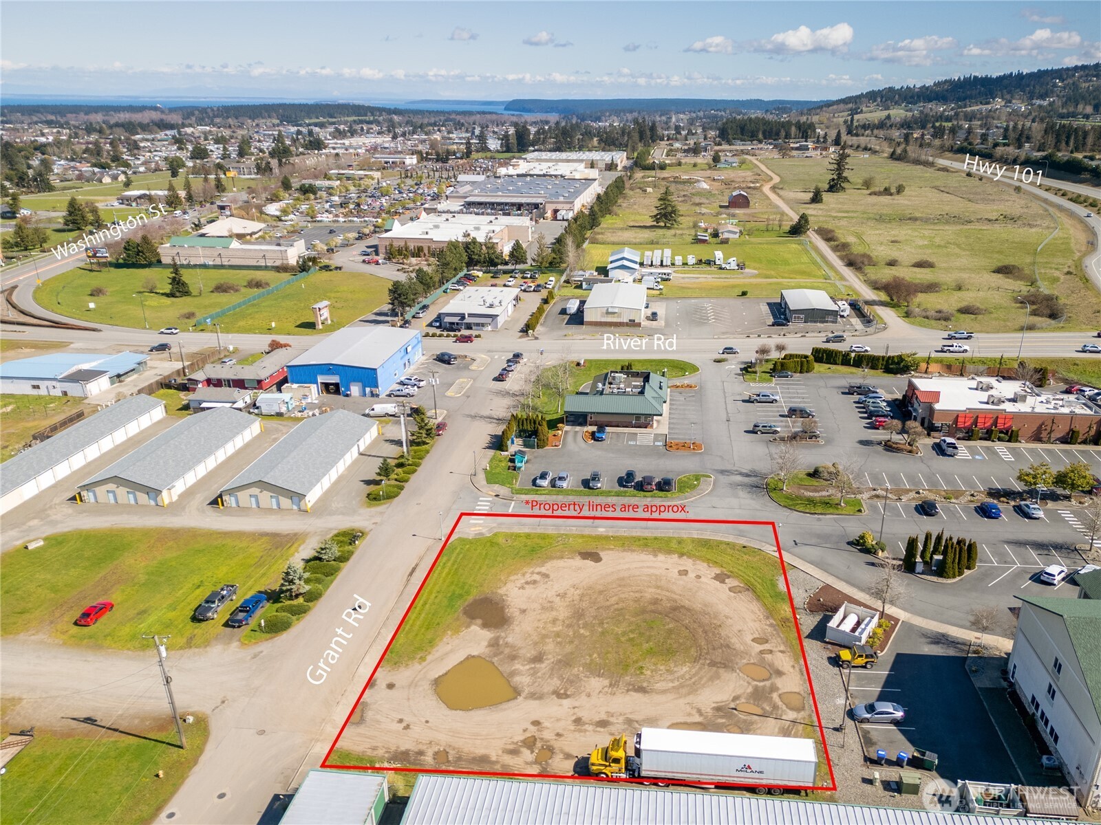 999 Grant Road Sequim, WA 98382 - Photo 5 of 8 an aerial view of residential houses with outdoor space