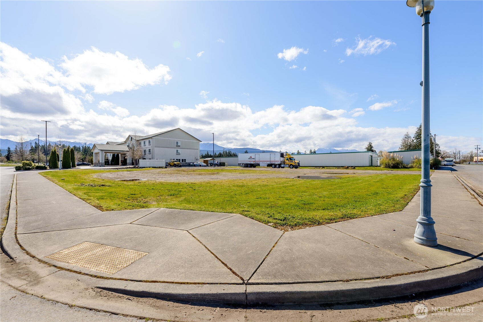 999 Grant Road Sequim, WA 98382 - Photo 6 of 8 a view of a house with a big yard