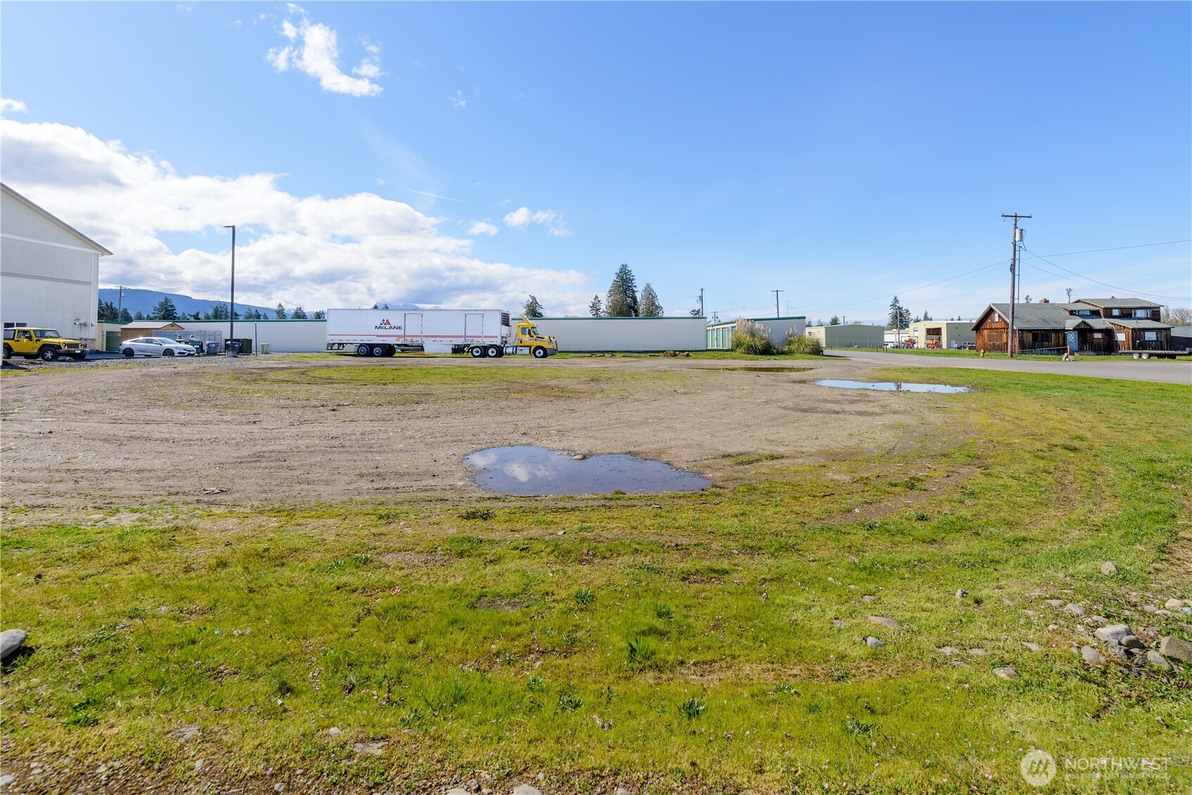 999 Grant Road Sequim, WA 98382 - Photo 8 of 8 a view of a lake with houses
