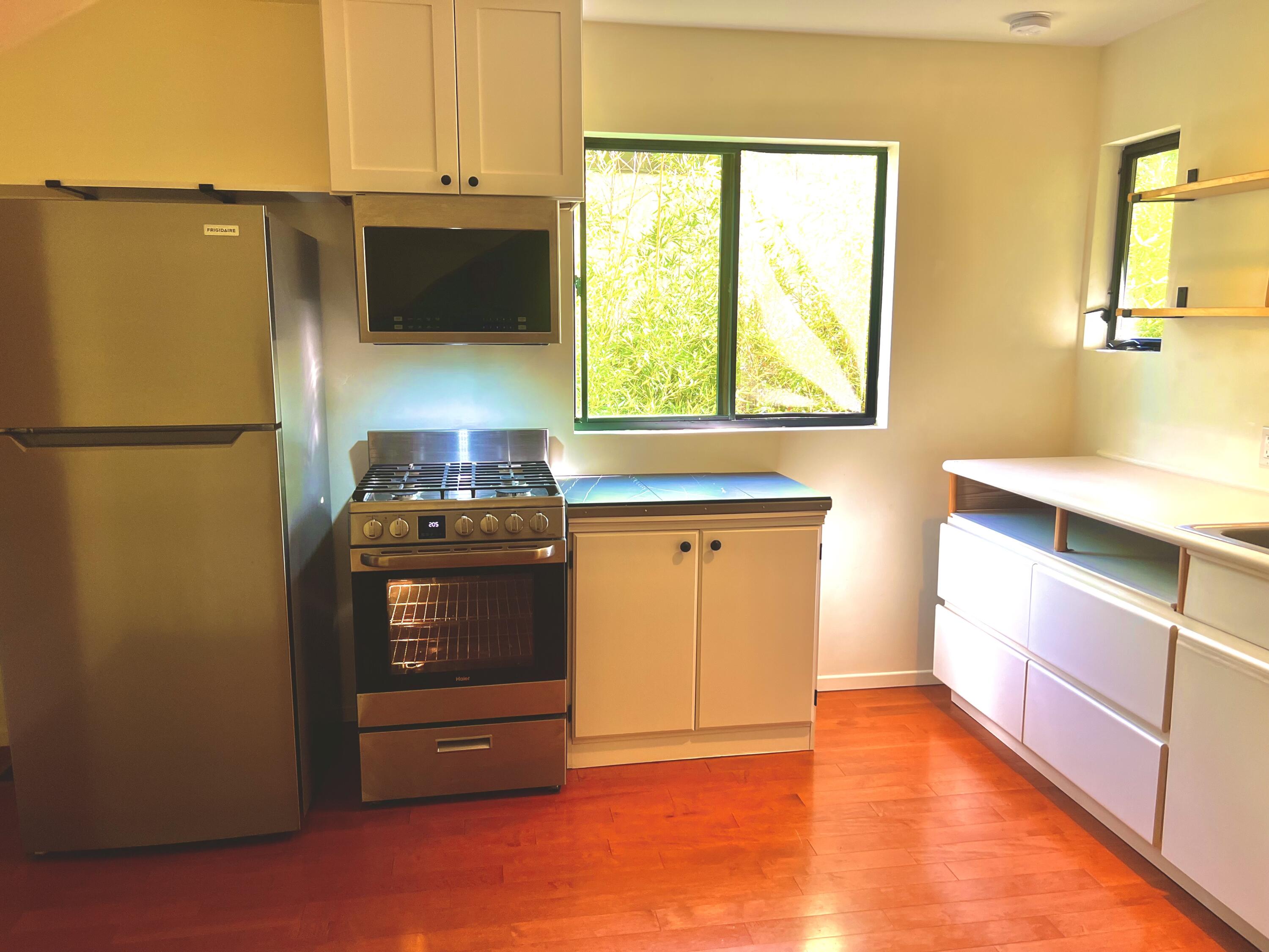 822 Chelham Way Montecito, CA 93108 - Photo 2 of 10 a kitchen with stainless steel appliances a refrigerator and a stove