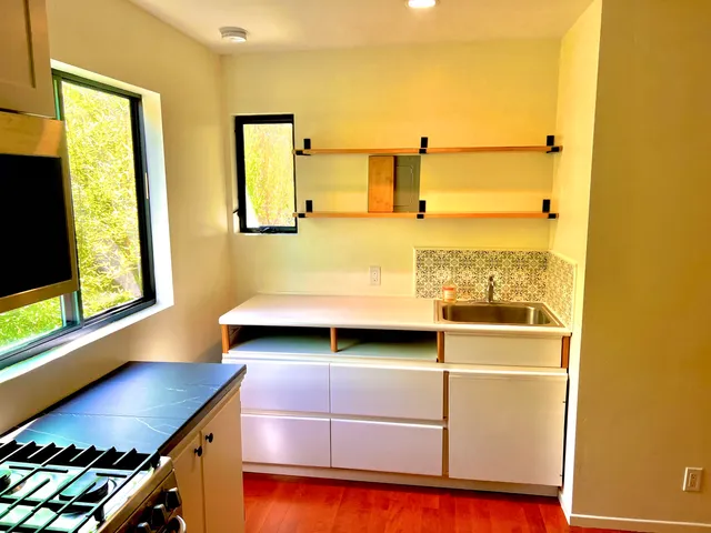 a kitchen with a window