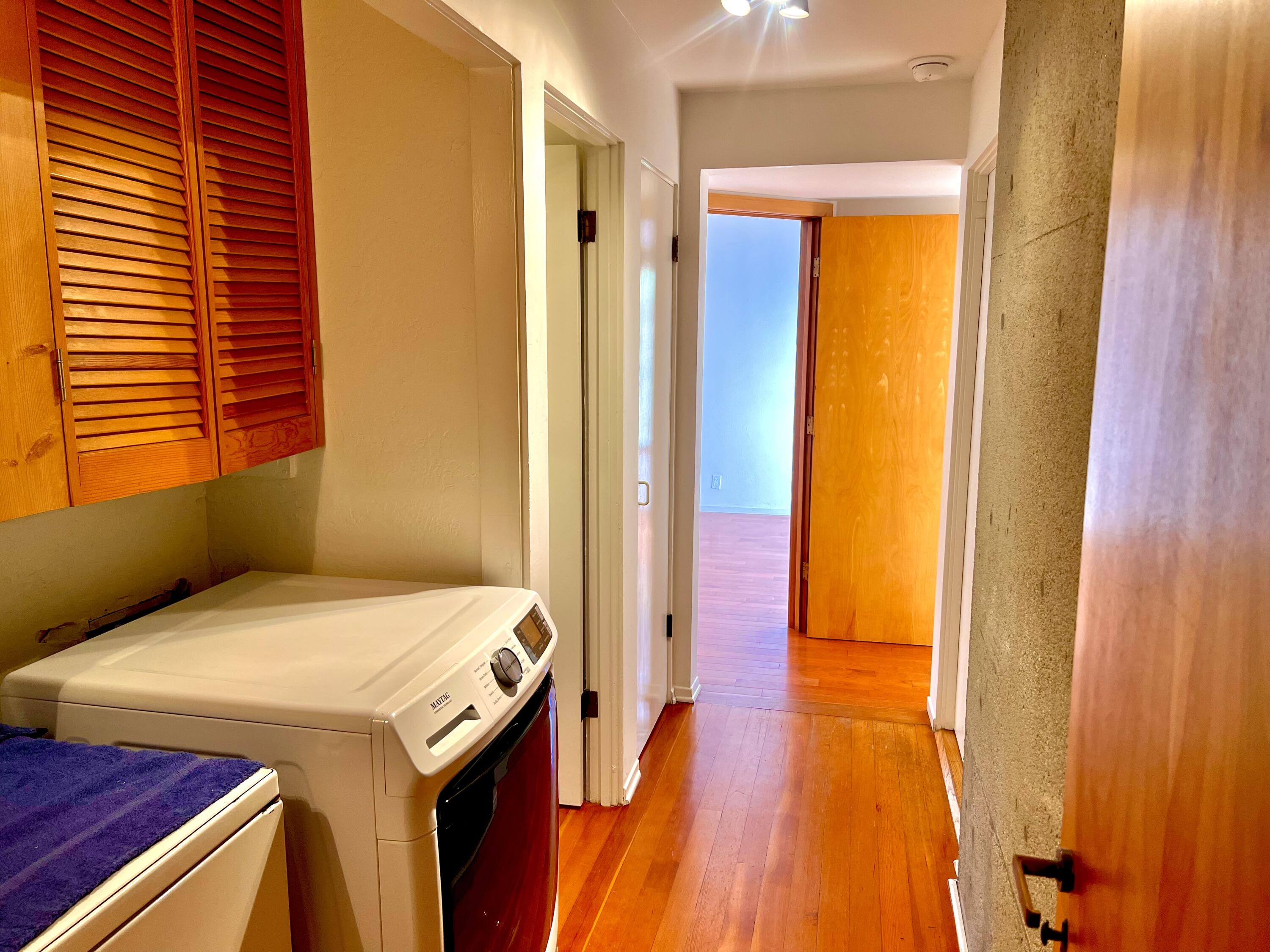 822 Chelham Way Montecito, CA 93108 - Photo 10 of 10 a utility room with a sink and a bed