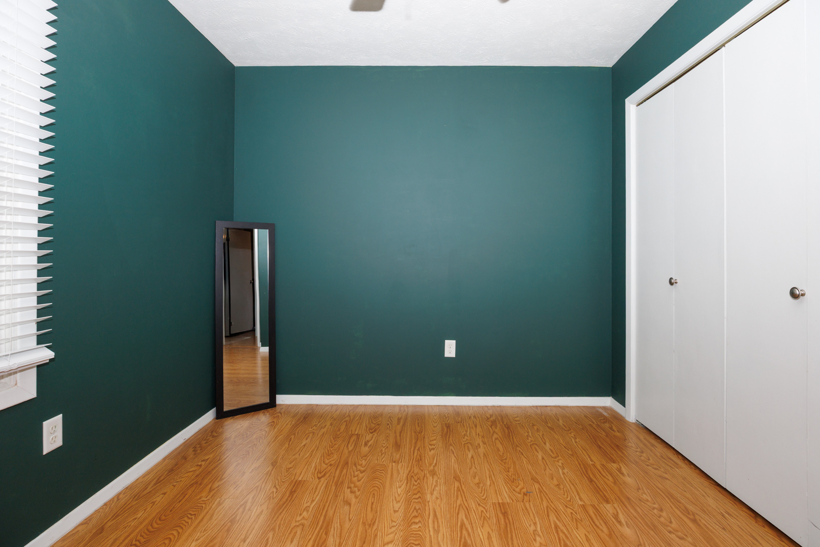 107 Regal Drive Normal, IL 61761 - Photo 21 of 41 an empty room with wooden floor