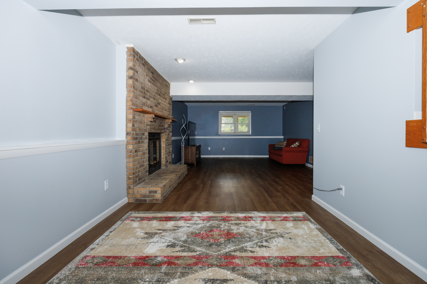 107 Regal Drive Normal, IL 61761 - Photo 27 of 41 a view of livingroom with furniture and a rug