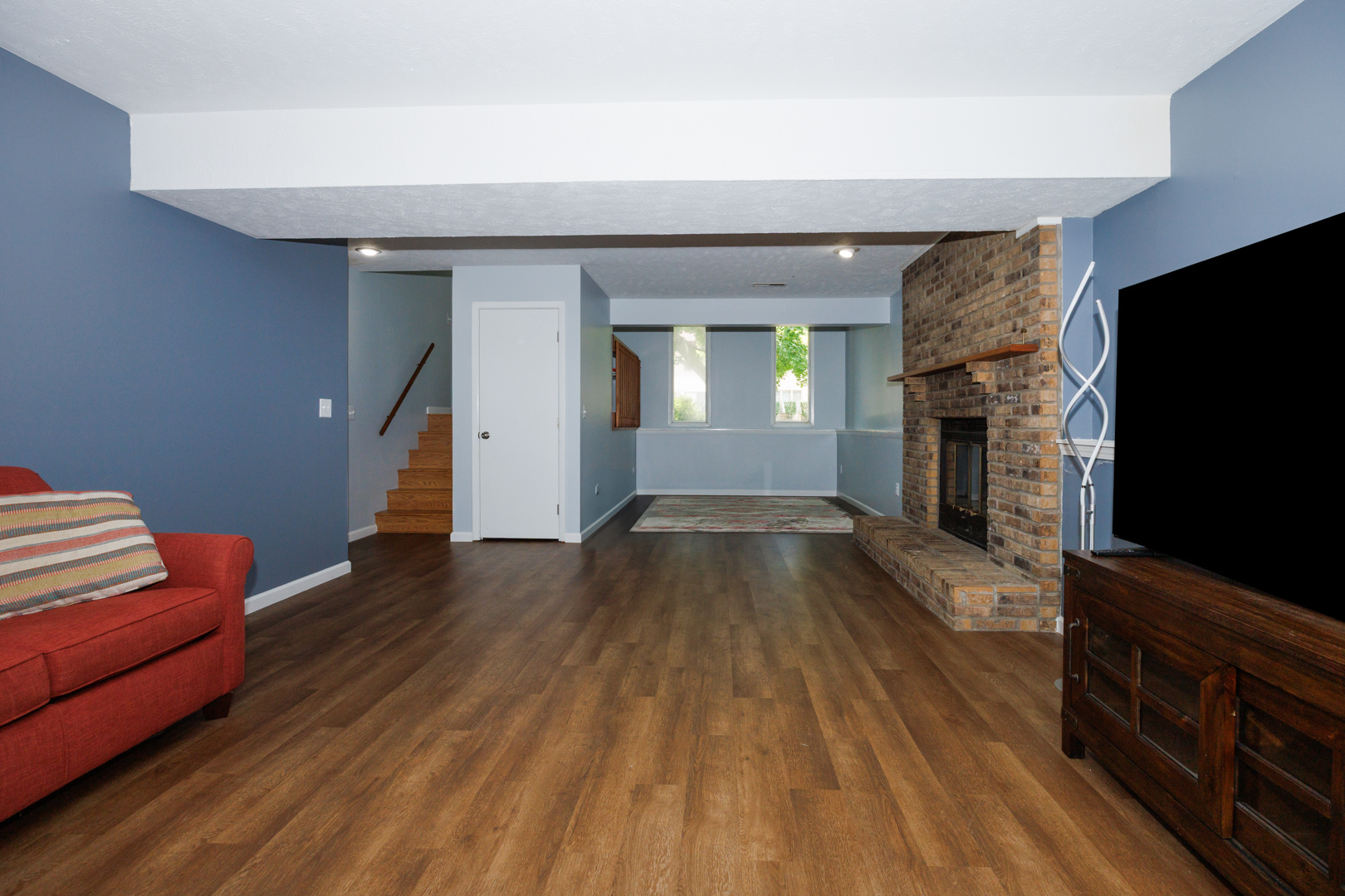 107 Regal Drive Normal, IL 61761 - Photo 29 of 41 a living room with furniture and a flat screen tv