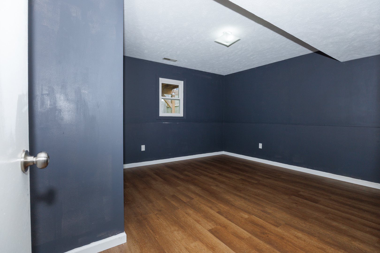 107 Regal Drive Normal, IL 61761 - Photo 31 of 41 a view of an empty room with a window