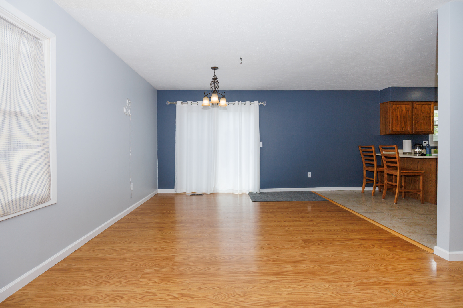 107 Regal Drive Normal, IL 61761 - Photo 6 of 41 a view of an empty room with a window