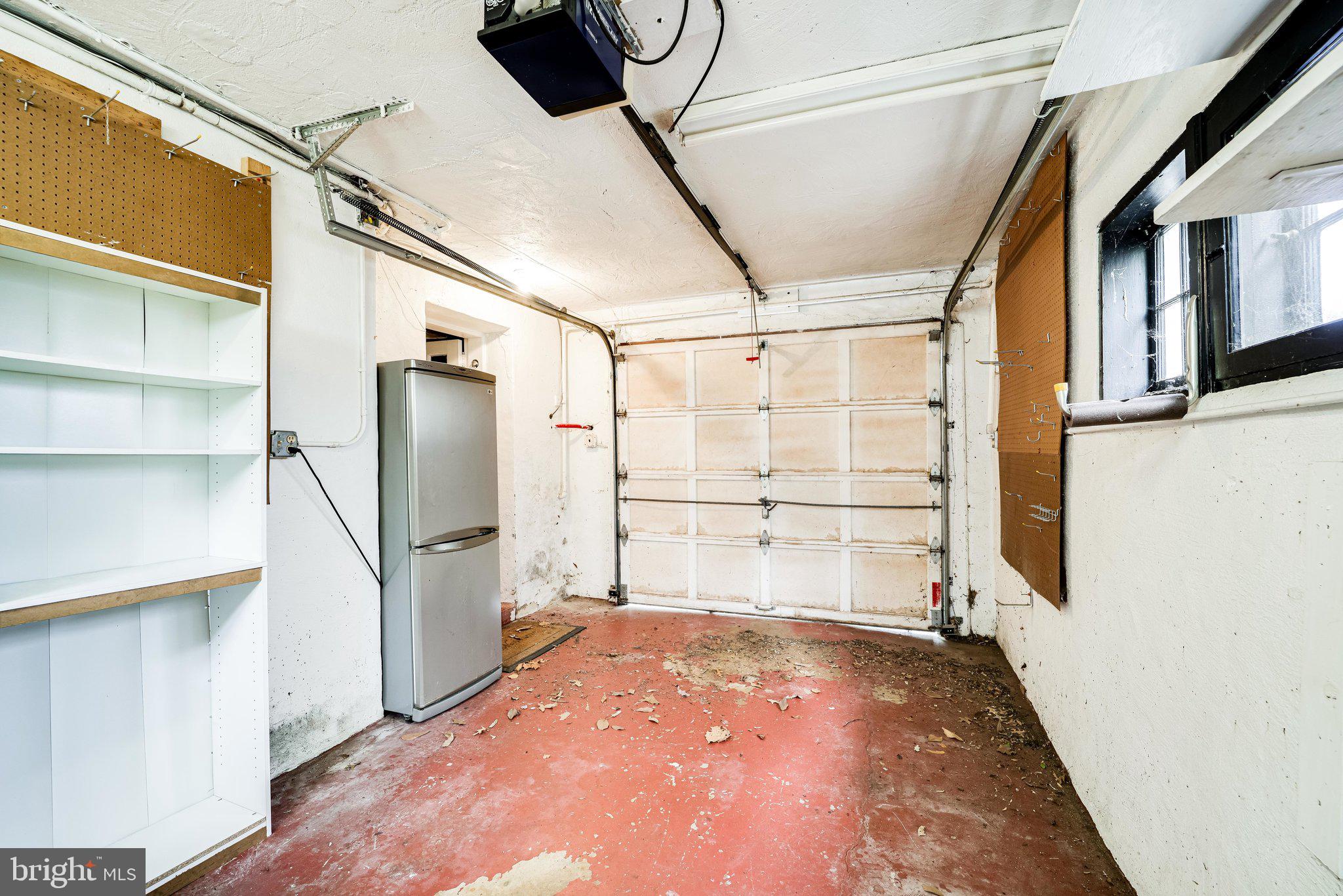 6016 Fort Hunt Road Alexandria, VA 22307 - Photo 56 of 69 1 car garage, storage and extra fridge