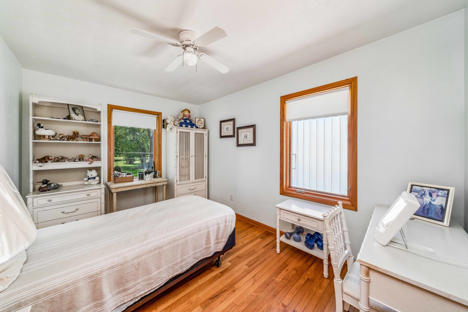 10096 Cherry Valley Road Genoa, IL 60135 - Photo 13 of 25 a bedroom with a bed and a window