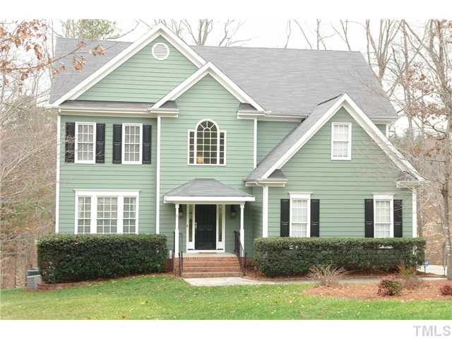 2808 Sunnystone Way Raleigh, NC 27613 - Photo 1 of 21 a front view of a house with a yard