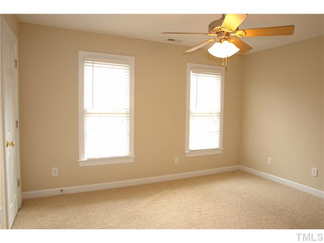 2808 Sunnystone Way Raleigh, NC 27613 - Photo 15 of 21 a view of an empty room and window