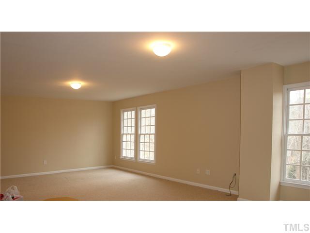 2808 Sunnystone Way Raleigh, NC 27613 - Photo 18 of 21 a black and white photo of a living room