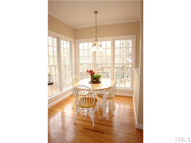 2808 Sunnystone Way Raleigh, NC 27613 - Photo 6 of 21 a living room with furniture and a large window