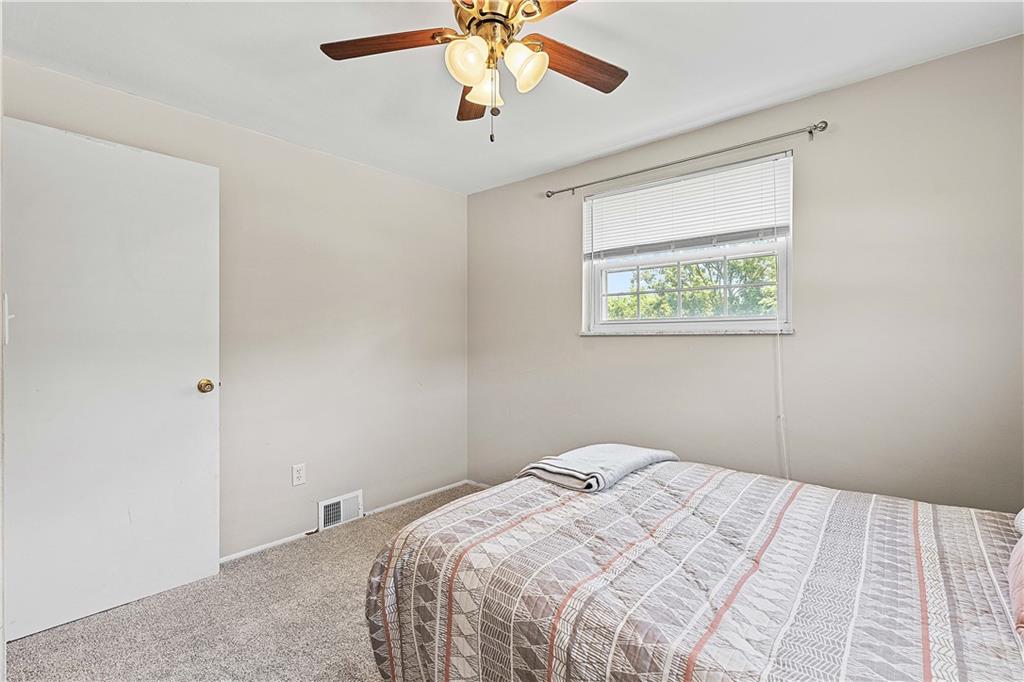 102 Adele Avenue Pittsburgh, PA 15223 - Photo 21 of 23 a bedroom with bed and a window