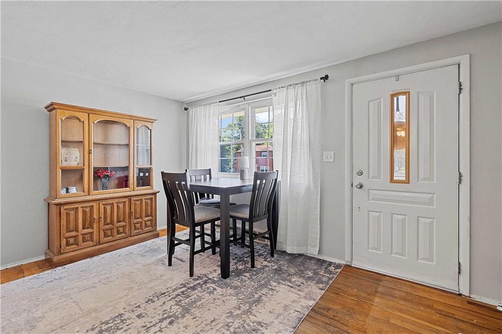 102 Adele Avenue Pittsburgh, PA 15223 - Photo 7 of 23 a view of a livingroom with furniture and window