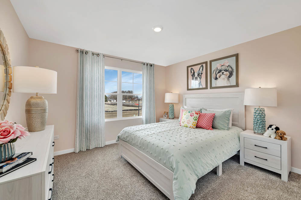 283 Snowdrop Lane Elgin, IL 60124 - Photo 21 of 38 a bedroom with a bed and closet with mirror