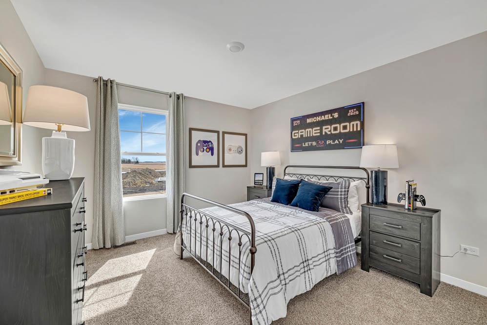 283 Snowdrop Lane Elgin, IL 60124 - Photo 25 of 38 a bedroom with a bed and a cabinets