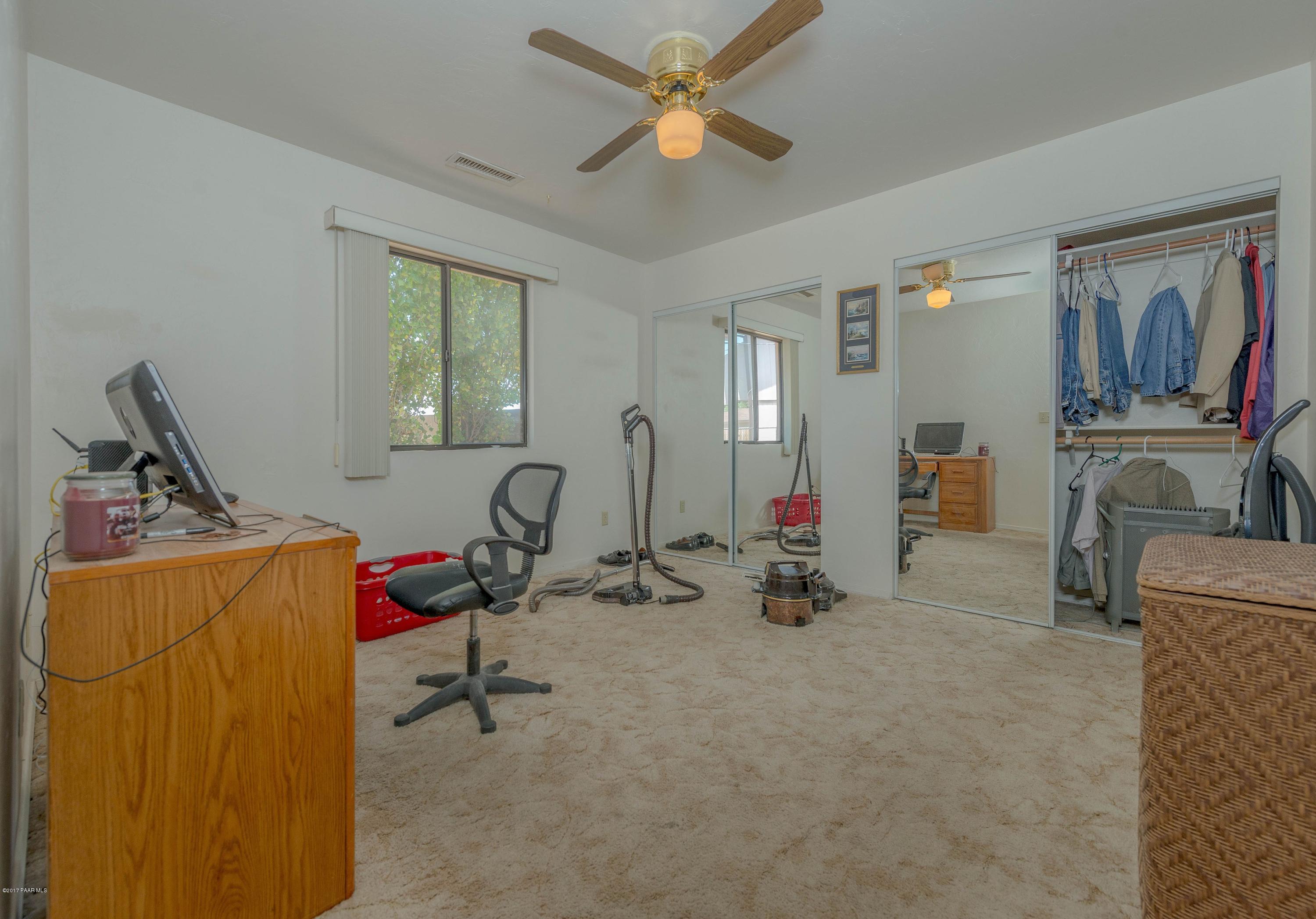 3265 North Yavapai Road East Prescott Valley, AZ 86314 - Photo 11 of 19 a view of a room with gym equipment