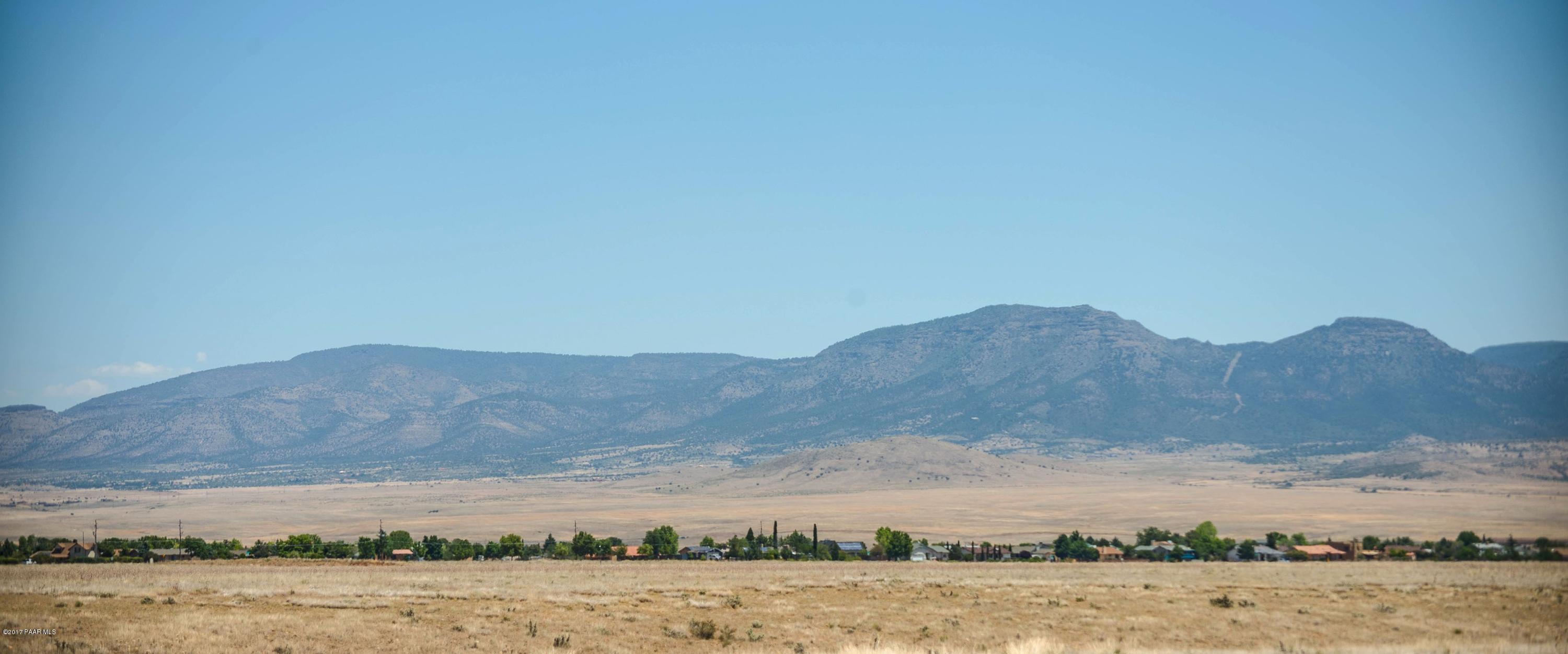 3265 North Yavapai Road East Prescott Valley, AZ 86314 - Photo 18 of 19 a view of lake with mountain in the background