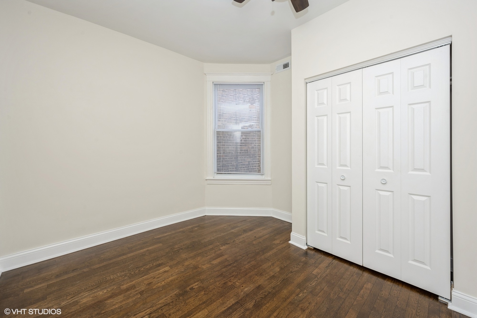 4954 West Augusta Boulevard, Unit 1 Chicago, IL 60651 - Photo 10 of 15 wooden floor in an empty room
