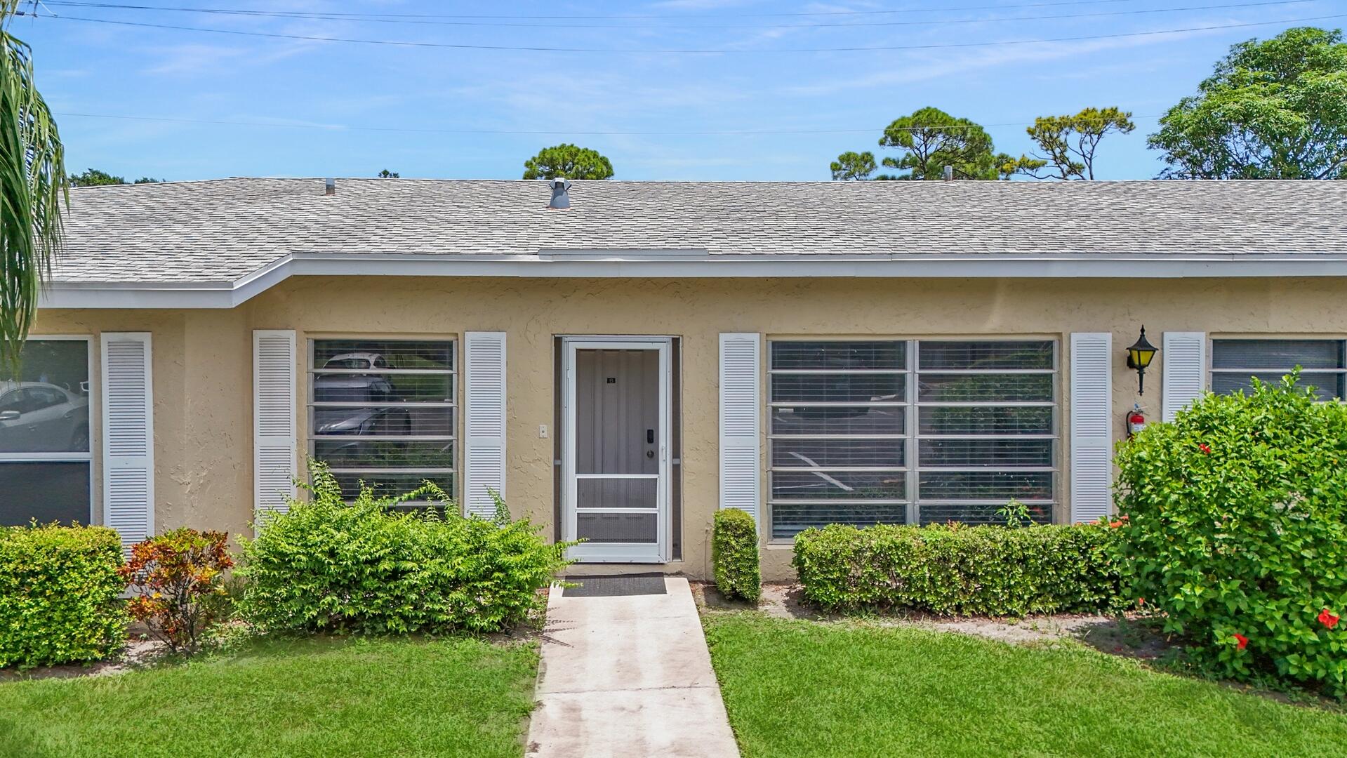 13670 Vía Flora, Unit B Delray Beach, FL 33484 - Photo 19 of 29 Aerial of Front