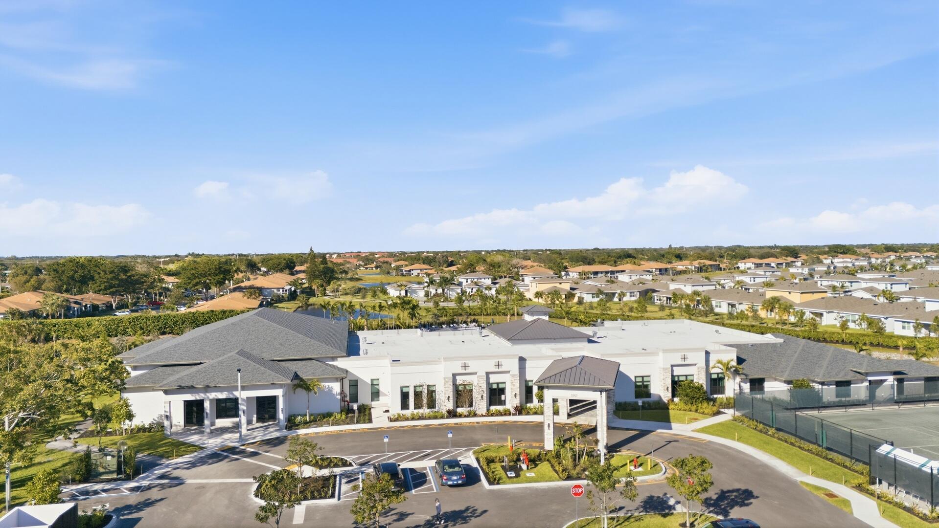 13670 Vía Flora, Unit B Delray Beach, FL 33484 - Photo 23 of 36 an aerial view of residential houses with outdoor space