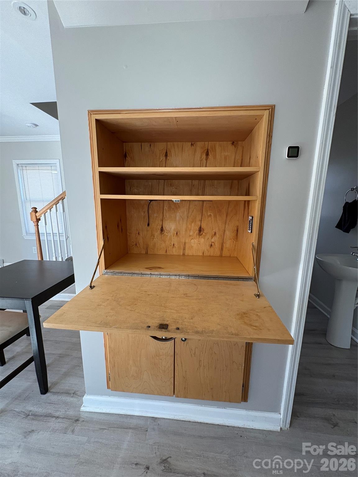 8591 Bartlett Road Mint Hill, NC 28227 - Photo 11 of 45 a room with wooden floor and furniture