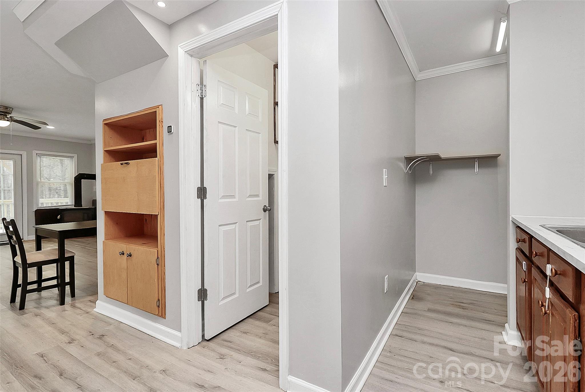 8591 Bartlett Road Mint Hill, NC 28227 - Photo 15 of 45 a view of a hallway with wooden floor and entryway