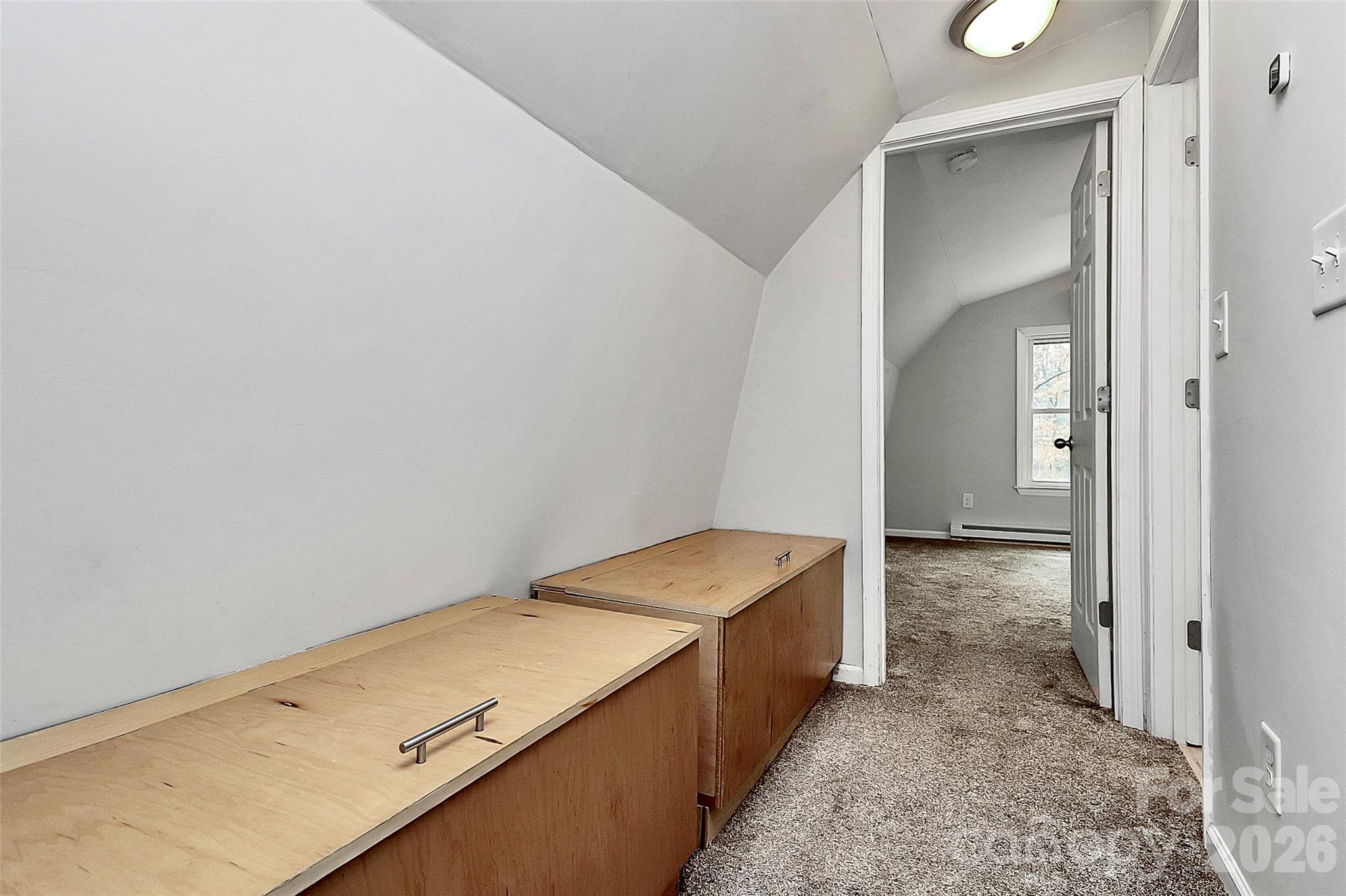 8591 Bartlett Road Mint Hill, NC 28227 - Photo 18 of 45 a room with a bed and cabinets