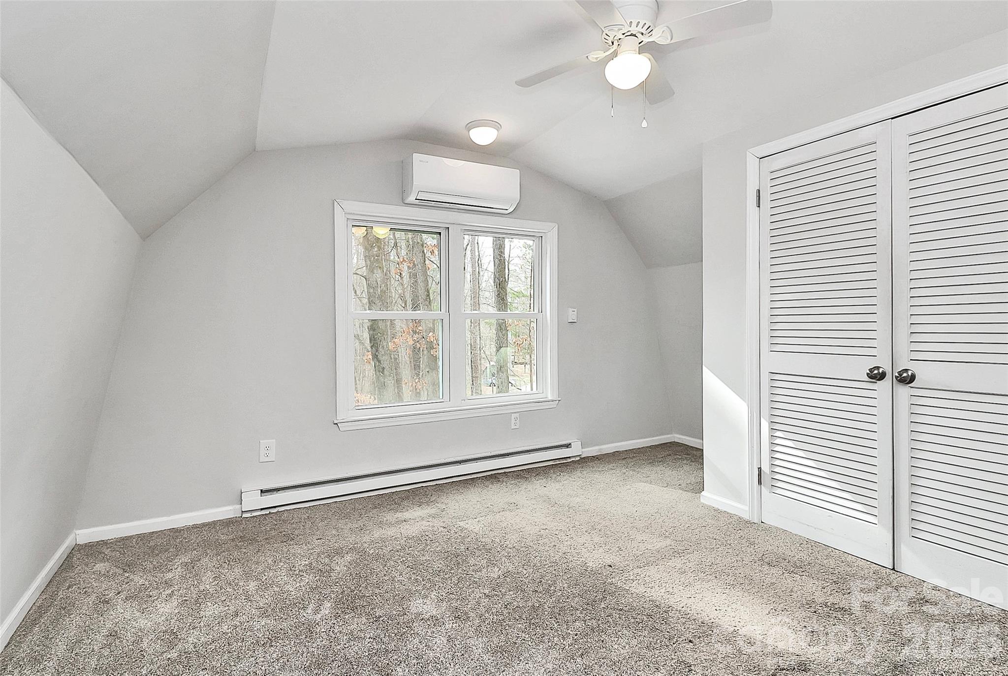 8591 Bartlett Road Mint Hill, NC 28227 - Photo 20 of 45 an empty room with a window